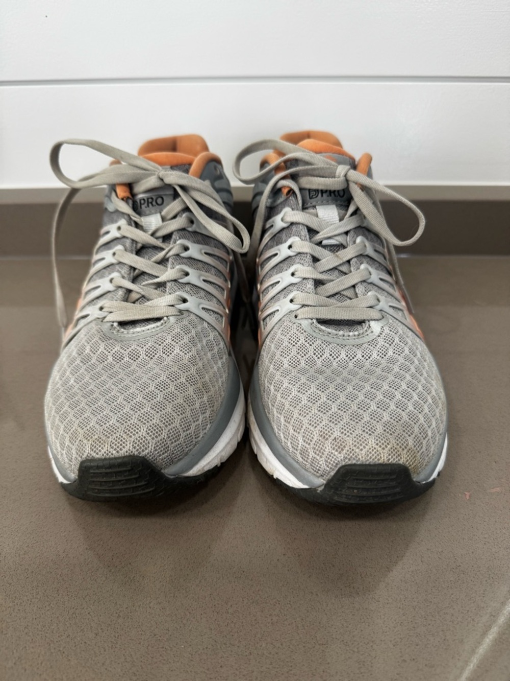 Abeo Pro Volt Women’s Sneaker in Coral/Gray Frost.